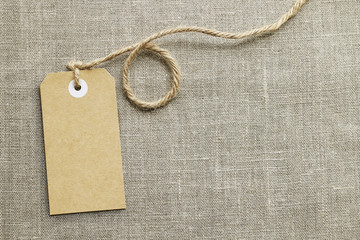 Paper price label on jute background