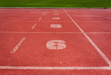 Fototapeta premium Red running track in stadium