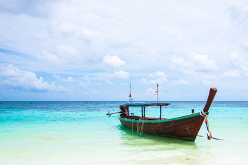 Boat at the white beach
