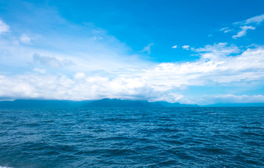 Fototapeta premium White clouds and blue sea