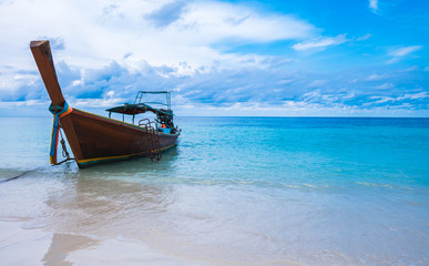 Boat at the white beach