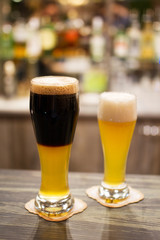 Glassed of dark beer and lager