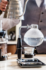 barista making coffee