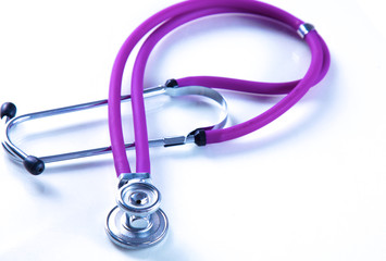 medical stethoscope near  laptop on  wooden table,  white