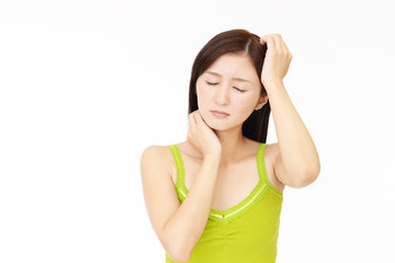 Fototapeta premium 頭痛を訴える女性