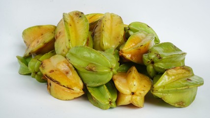 Starfruits: Stack of Star Fruits isolated on bright background