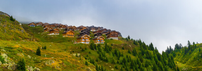 Fototapeta na wymiar Tschuggen is holiday village in the Belalp area and consists of 100 chalets.
