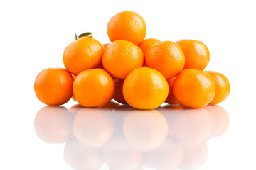 Tangerines with leaves on white background