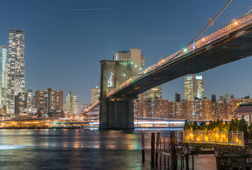 Brooklyn Bridge at twilight with downtown Manhattan