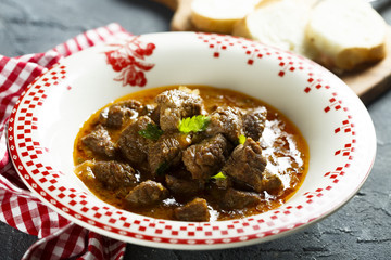 Classic beef goulash with tomatoes