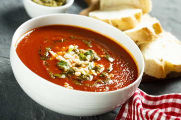 Tomato soup with cheese and pesto sauce