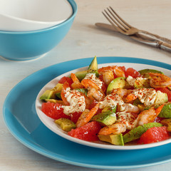 Salad - a mix of avocado, shrimp and grapefruit.