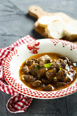 Classic beef goulash with tomatoes
