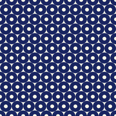 Seamless pattern with symmetric geometric ornament. Abstract repeated circles background