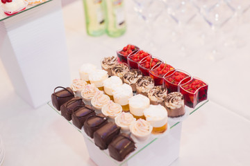 Different kinds of baked sweets on a buffet