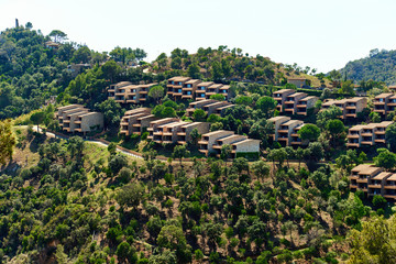 Modern hillside suburban houses. Spain
