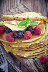 Pancake - Crepes with berries, mint and honey