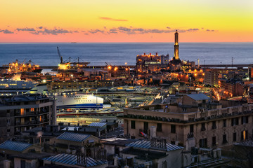 view of Genoa harbor at sunset