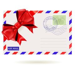 Air mail envelope with red ribbon bow
