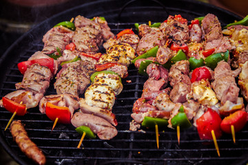 Skewers of meat on the barbecue