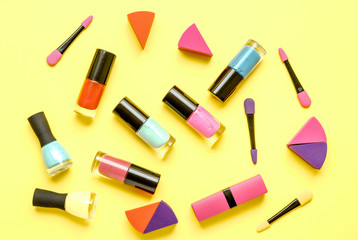 Obraz premium make up set on yellow background top view