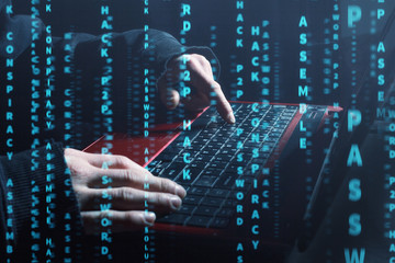 hacker at work with graphic user interface around