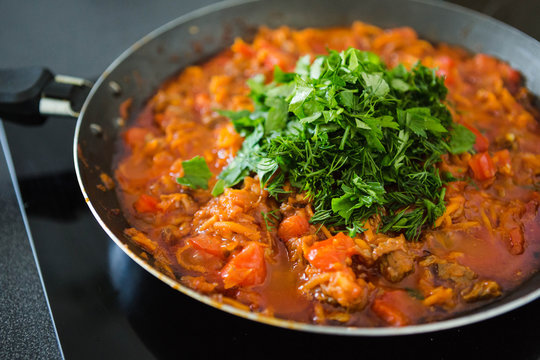 fried onions and carrots, filling soup, garlic, homemade food, chopped parsley, dill