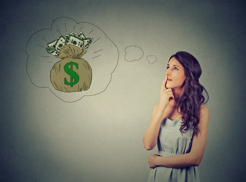 Woman dreaming of financial success