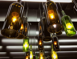 Magnificent retro light lamp decor made of the wine bottles