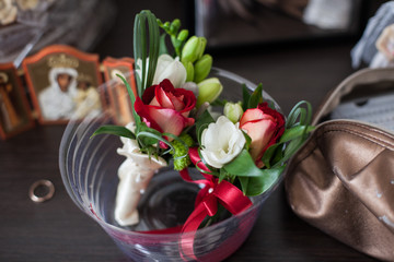The buttonholes stand in the vase