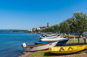 Naklejka na ściany i meble Bolsena lake (Lazio, Italy) - The town of Marta, province of Viterbo