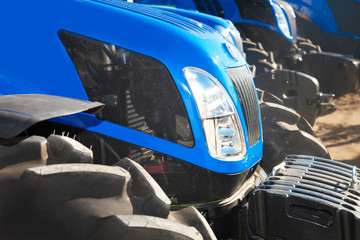 Obraz premium Close up of tractors on a row
