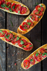 Bruschetta with tomatoes and greens