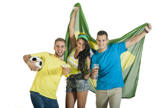 A group of Brazilian football or soccer supporters celebrating.