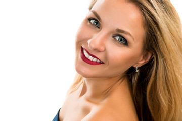 Portrait of a beautiful young happy woman on a white background