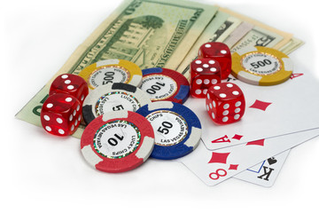 Gambling money, dice and cards