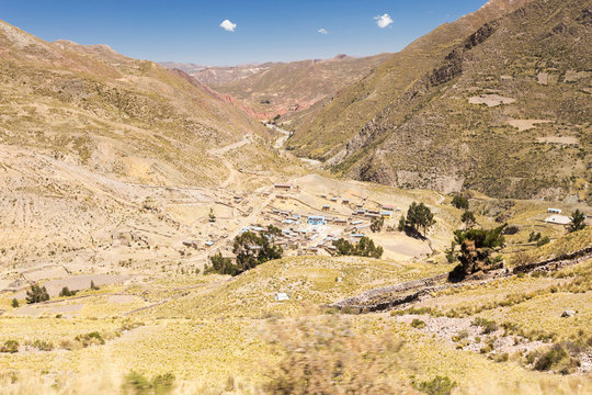 Bolivia village mountains road agriculture terraces.