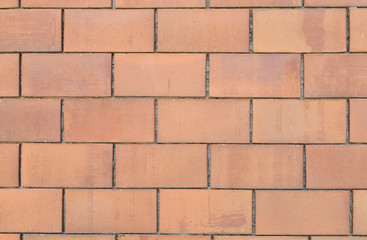 Obraz premium Orange tile wall pattern background