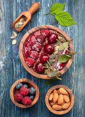 Bowl smoothie with cherry and raspberry. top view