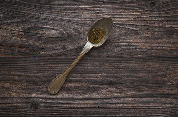 Οlive oil in  vintage spoon