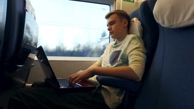 boy traveling on the train "Sapsan"
