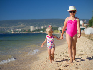 Two girls on sea coast