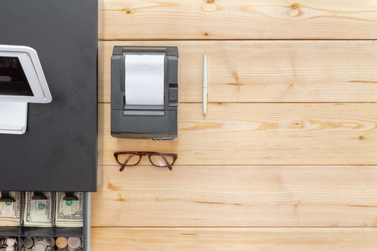 Business Cash Register On A Clean Desk