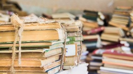 Books scattered in sloppy pile