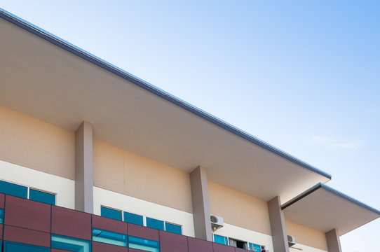 New Apartment Building Over Blue Sky,Low Angle Architectural Exterior View Of Modern