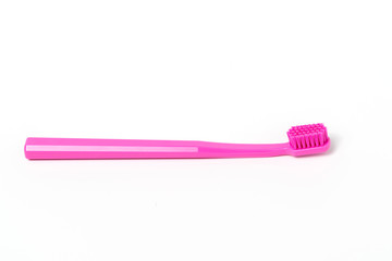 Close up shot of toothbrush isolated on white background
