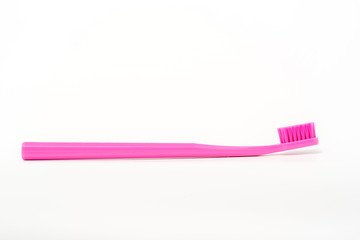 Close up shot of toothbrush isolated on white background
