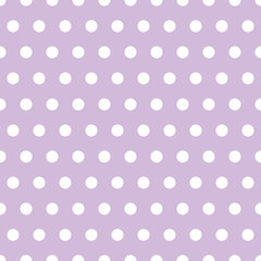 white polka dots on a lavender background