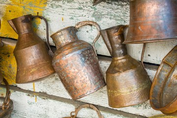 Large old antique copper cans