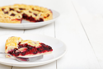 Homemade berry pie and cut a piece